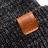 Mystery Beanie | Black | Leather label | closeup