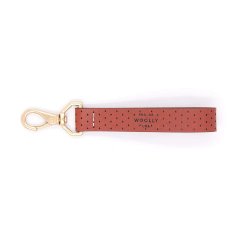 WOOLLY perforated looped key chain | brown